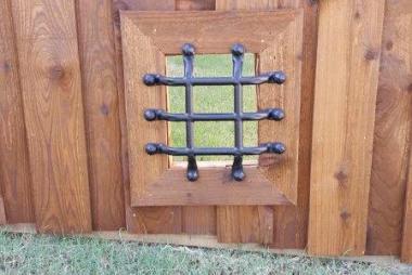 Speakeasy Dog Window on Privacy Fence in McKinney, TX