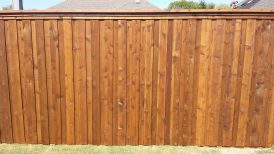 Board on Board Cedar Fence with Top Cap and Trim