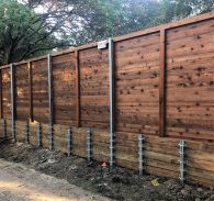 Horizontal Wood Fence with Wood Retaining Wall