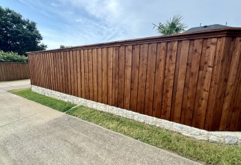 Pre-Stained Cedar Wood Fence with Stone Retaining Wall