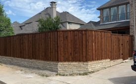 Pre-Stained Cedar Wood Fence with Stone Retaining Wall