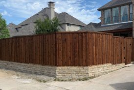 Pre-Stained Cedar Wood Fence with Stone Retaining Wall