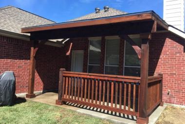 Shed Patio Cover with Porch Railing in Allen, TX