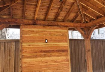 Hip Patio Cover with Exposed Rafters and TV Wall in Dallas, TX