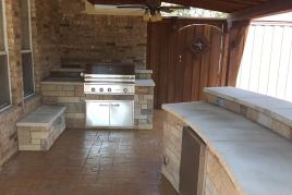 Mixed Lueder Stone Outdoor Kitchen and Bar in Allen, TX