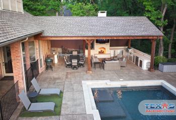 Gable Patio Cover with  Outdoor Kitchen and Fireplace in Plano, TX