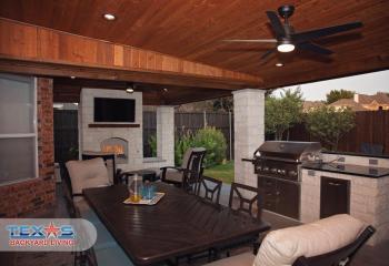 Drop Down Ceiling Patio Cover with Outdoor Kitchen and Fireplace in Dallas, TX