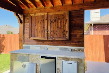 Cedar TV Cabinet with Privacy Wall and Outdoor Kitchen Prep Station in Plano, TX
