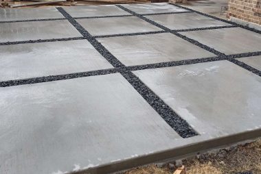 Gray Broom Pavers with Black Tejas Gravel in Frisco, TX