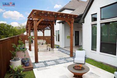 Travertine with Concrete Pavers and Pebbles in Frisco, TX