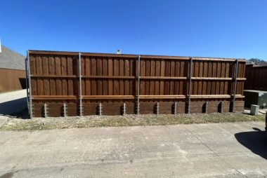 Fence retaining wall