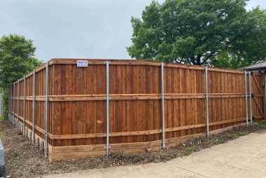 Fence retaining wall