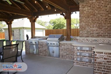 ©WWW.LRTRSTUDIOS.COM-PC-Flat-with-Gable-Outdoor-Kitchen-Fireplace-517A3748-LOGO
