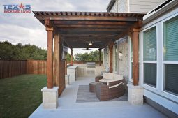 Pergola Posts Wrapped with Cream Lueder Stone Columns