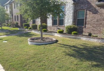 Austin Stone with Brick Border Flower Bed Border McKinney, TX